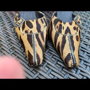 Donald Pliner animal hair slides.